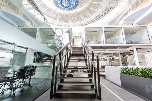 Preview: Two-floor business center with individual work cabinets and metal staircase