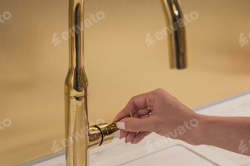 Preview: The girl opens the faucet for washing hands