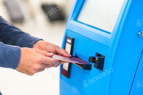 Preview: Closeup passport doing check-in for flight or buying airplane tickets at airport