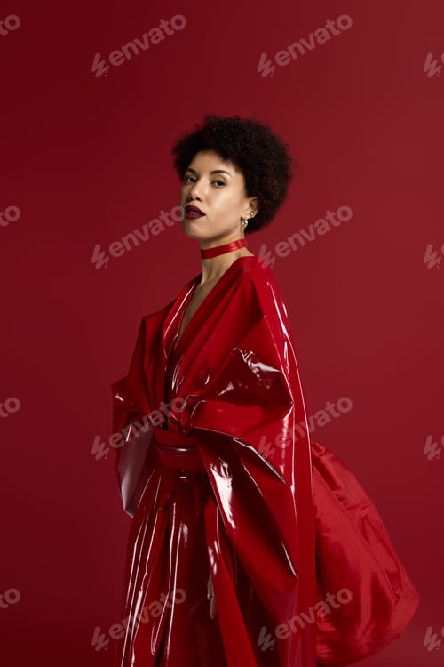 Preview: Striking elegance in a vibrant red ensemble celebrating bold fashion choices