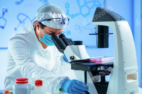 Preview: Biotechnology engineer inspecting cell culture flask