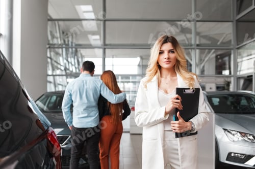 Preview: Portrait of a car sales manager woman. Auto dealership representative