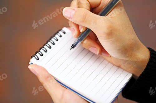 Preview: Pen in hand writing