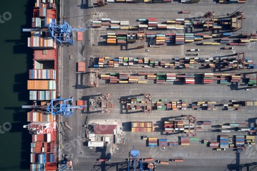 Preview: Aerial view of dock with containers.