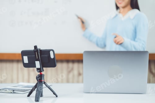 Preview: Teacher addressing university students in a classroom