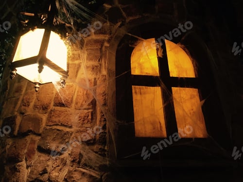 Preview: Spooky window with lamp and spider web
