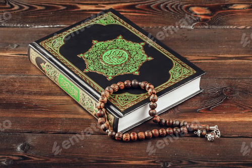 Preview: islamic holy book on wooden table