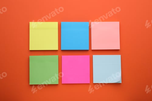 Preview: Paper notes on orange background, flat lay
