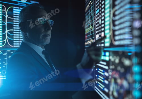 Vista previa: The man working on the big digital screen in the dark room