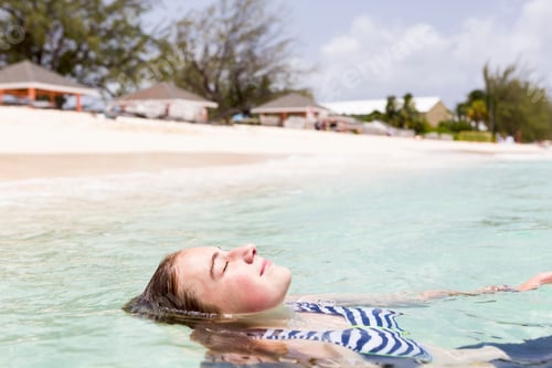 Preview: 13 year old girl floating in the ocean