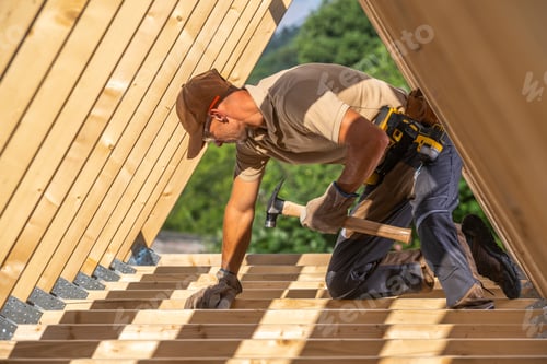 Preview: Carpentry Work on a New Roof Frame at a Construction Site