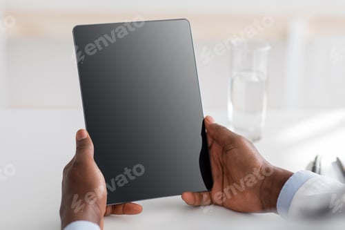 Preview: Doctor advice and technology for treat. African american doctor using digital tablet with black
