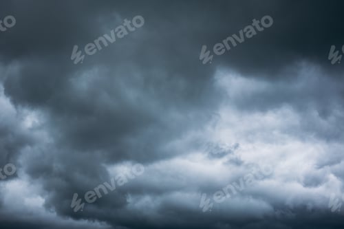 Preview: Overcast sky with dark clouds. Dark sky before a thunder-storm.