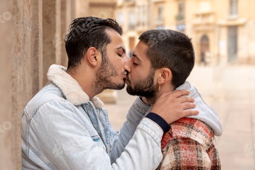 Preview: close up of gay couple kissing at street