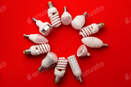 Preview: LED light bulbs on red background top view