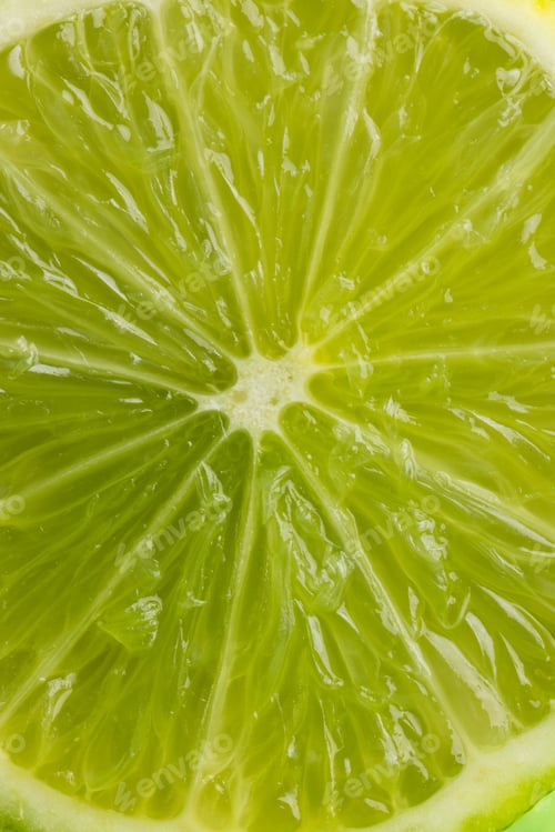 Preview: Close up of halved lime and copy space background