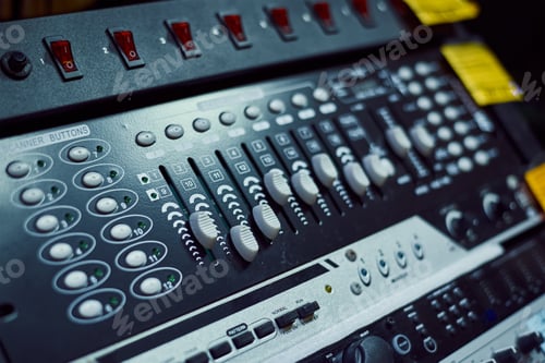 Preview: Audio music mixer console on a black background. Sound studio mixing desk