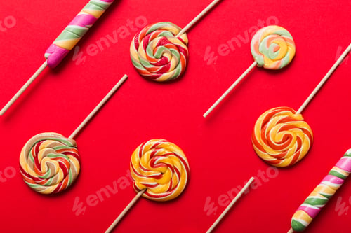 Preview: Set of colorful lollipops on colored background. Summer concept.