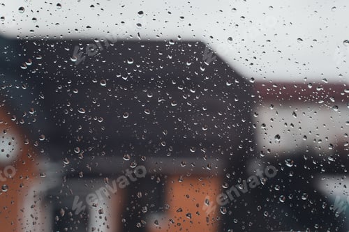 Preview: Rainy, cloudy weather. Raindrops on surface of window