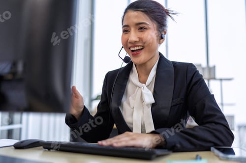 Preview: Operator agent with headsets working in a call center giving help as a customer service officer
