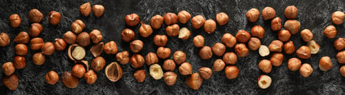 Preview: Healthy food and healthy nutrition concept, nuts - hazelnut