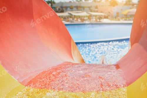 Preview: Water park with water colored flights, slides, splashes and pools at luxury hotel. summer vacation