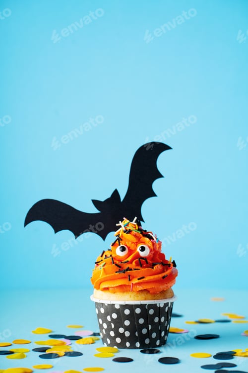 Preview: Monster orange funny cupcakes with eyes, halloween