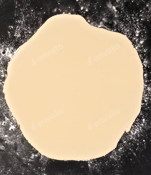 Preview: Preparation of the dough. The rolling pin with flour on a dark background