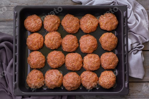 Preview: Raw beef and pork meat cutlets, cooking at home