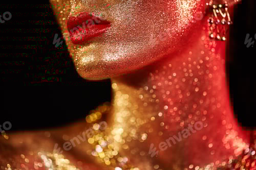 Preview: Portrait of beautiful woman with sparkles on her face