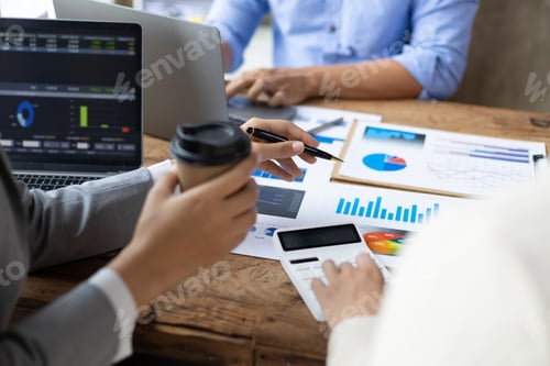 Preview: Financial consulting business meeting together to discuss financial chart analysis.
