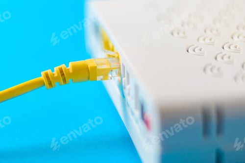 Preview: internet modem router hub with a cable connecting on blue background