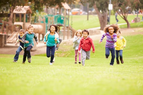 Preview: Group Of Young Children Running Towards Camera In Park
