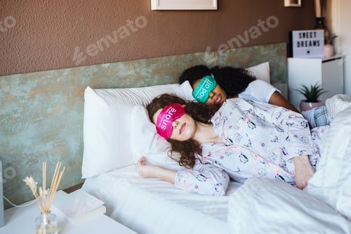 Preview: Girls relaxed sleeping in bed with blindfold at home