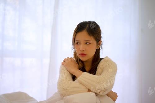 Preview: Pretty woman has emotional stress at bedroom.
