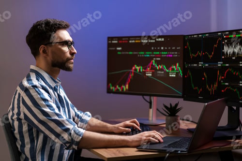 Preview: Trader working with crypto chart, analyzing stock market, working in office. Online trading