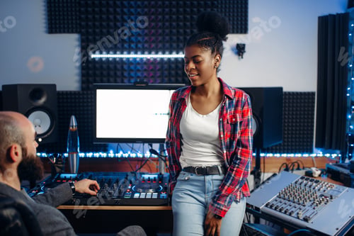 Preview: Sound operator and female performer in studio