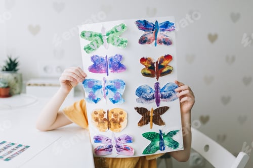 Preview: A little girl in a yellow dress made butterflies. Painted in watercolor collage