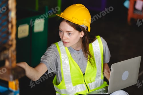 Preview: woman engineer inspection check control heavy machine robot arm construction installation