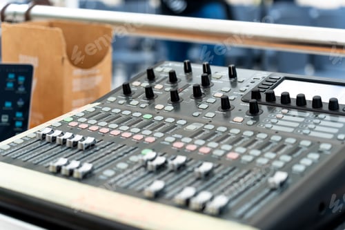 Preview: Sound engineer working with a professional sound console