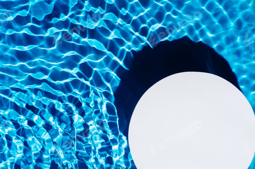 Preview: White circle copy space in transparent fresh blue water gel surface with flecks, waves, shade.