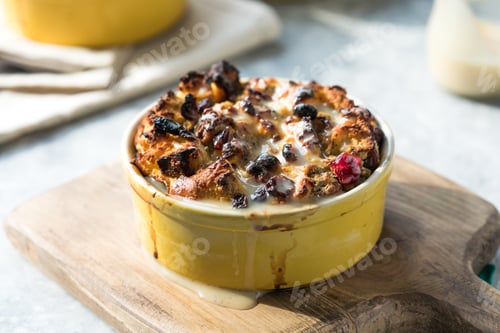 Preview: Homemade bread pudding breakfast casserole with apples and cinnamon and egg white frosting