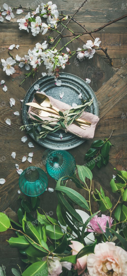 Preview: Flat-lay of Table setting with spring flowers, vertical composition