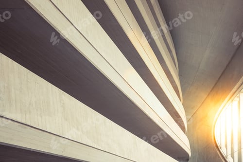Preview: Warm tones background of the interior of a minimalist construction of rough textured walls and lines