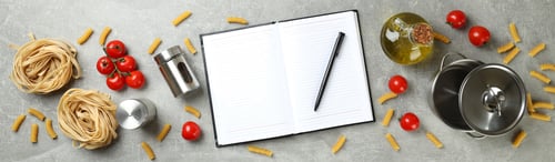 Preview: Concept of recipe on gray textured table, space for text