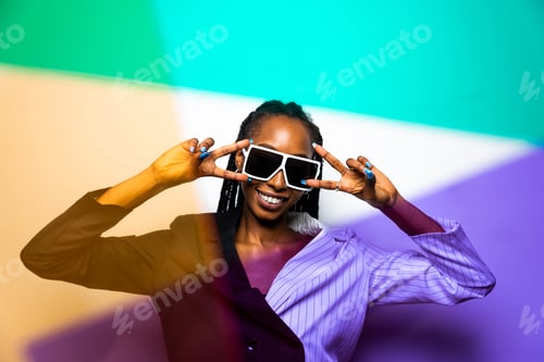 Preview: Beautiful afro woman with pigtails and stylish clothes