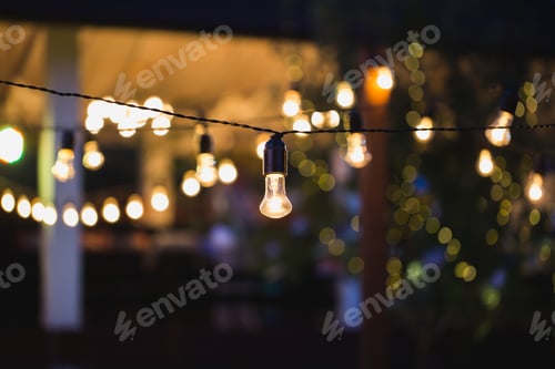 Preview: Light bulb decor in outdoor party
