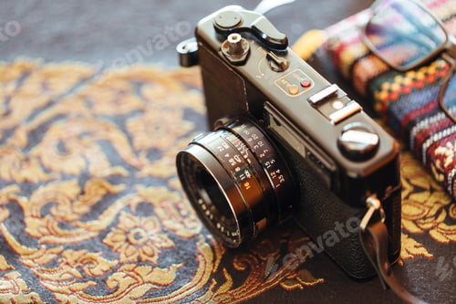 Preview: Vintage camera on a decorative table