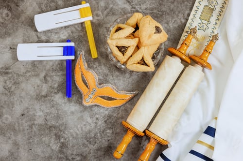 Preview: Happy Purim celebration Jewish holiday carnival decoration with hamantaschen cookies a shofar tallit