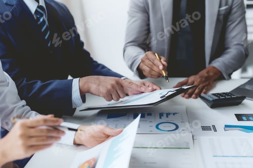Preview: Business people meeting explaining the financial graph data and marketing plan.